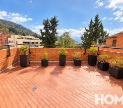 10Sunlit Rooftop Terrace with Mountain Views