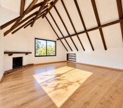 11Sunlit Rustic Loft with Exposed Beams