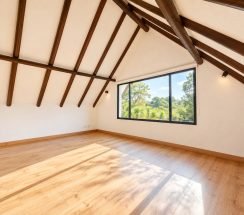 13Sunlit Exposed-Beam Attic Loft