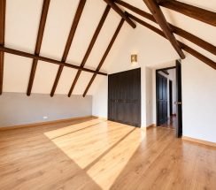 14Sunlit Rustic A-Frame Loft Bedroom