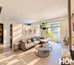 aSunlit Modern Living Room with Art