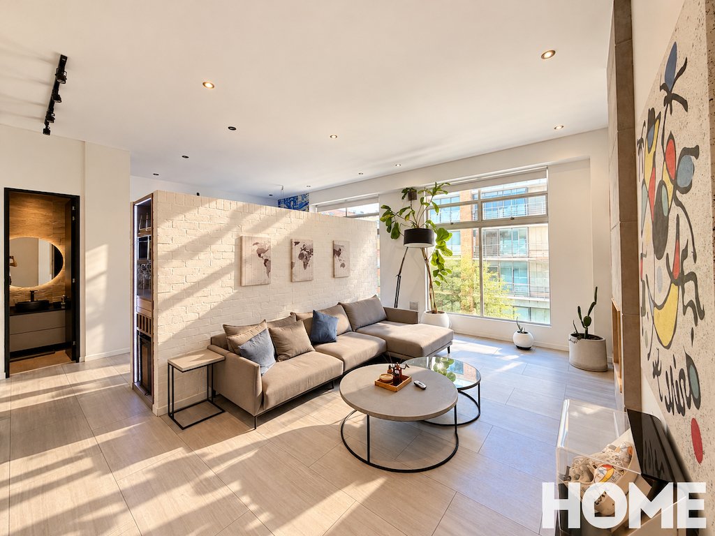 aSunlit Modern Living Room with Art